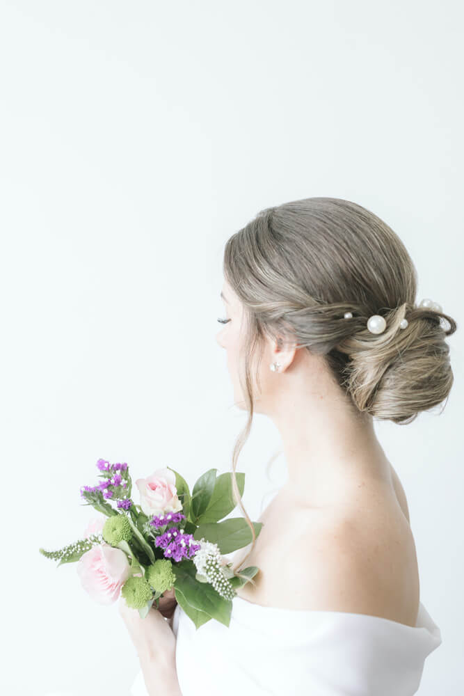 Classic low bun wedding hairstyle
